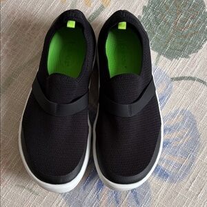 OOFOS Black and White Slip-On Shoes